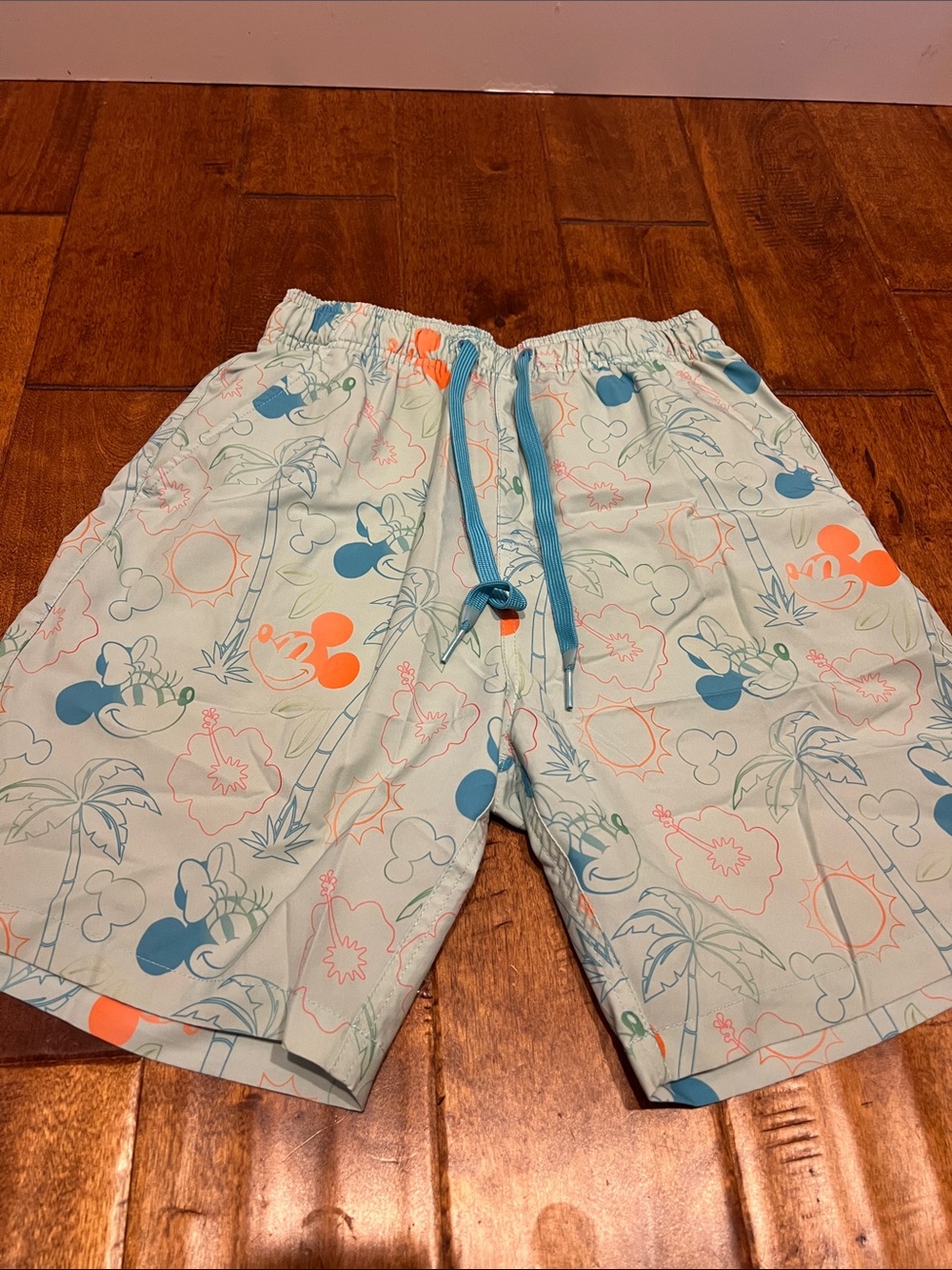 Disney Light Blue Kids Swim Trunks with Orange & Blue Mickey Print